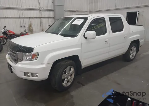 2011 Honda Ridgeline Rtl z USA, uszkodzony, nr VIN 5FPYK1F5XBB454323